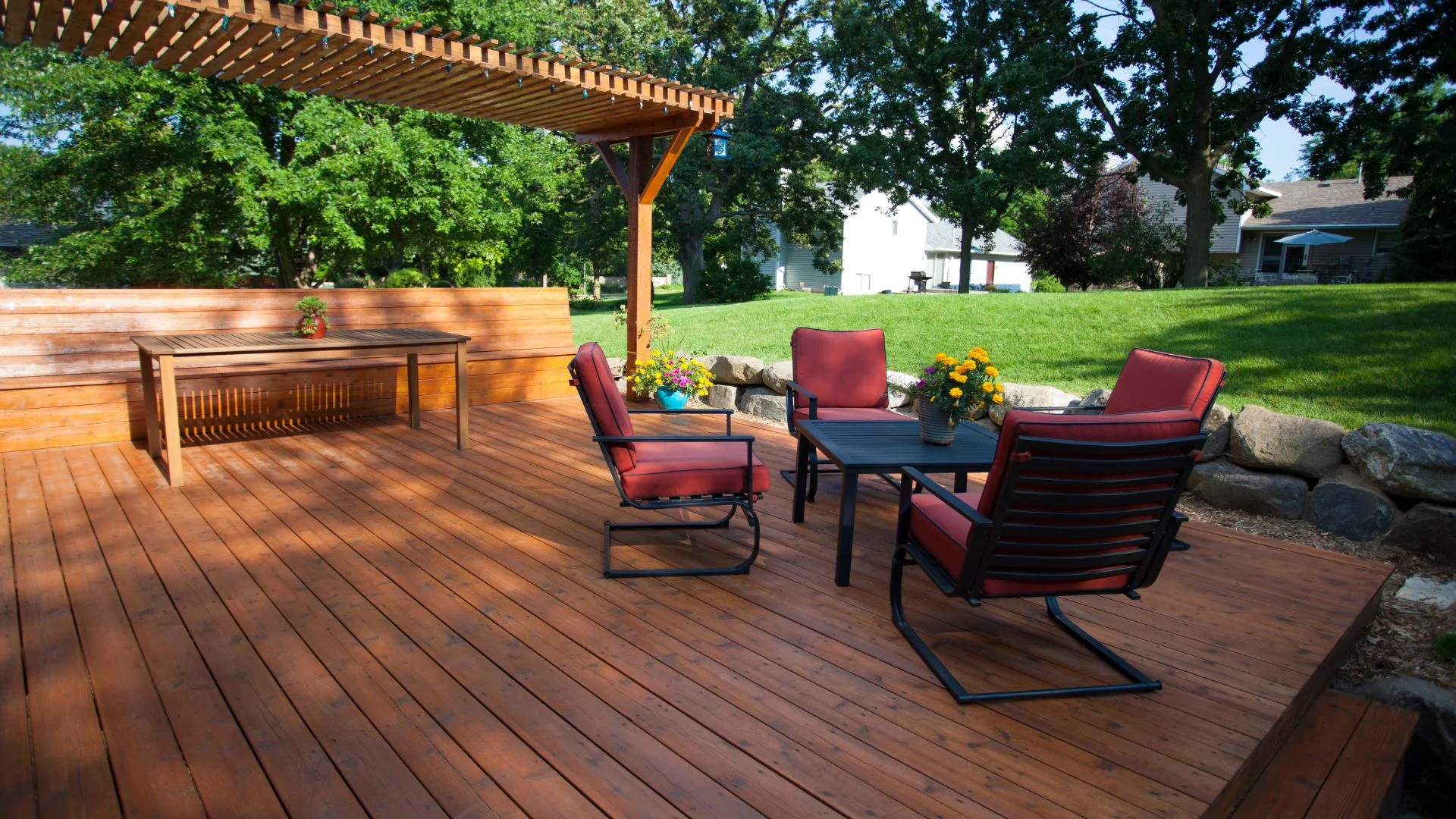 Completed capped composite deck installation on a backyard in San Antonio, TX