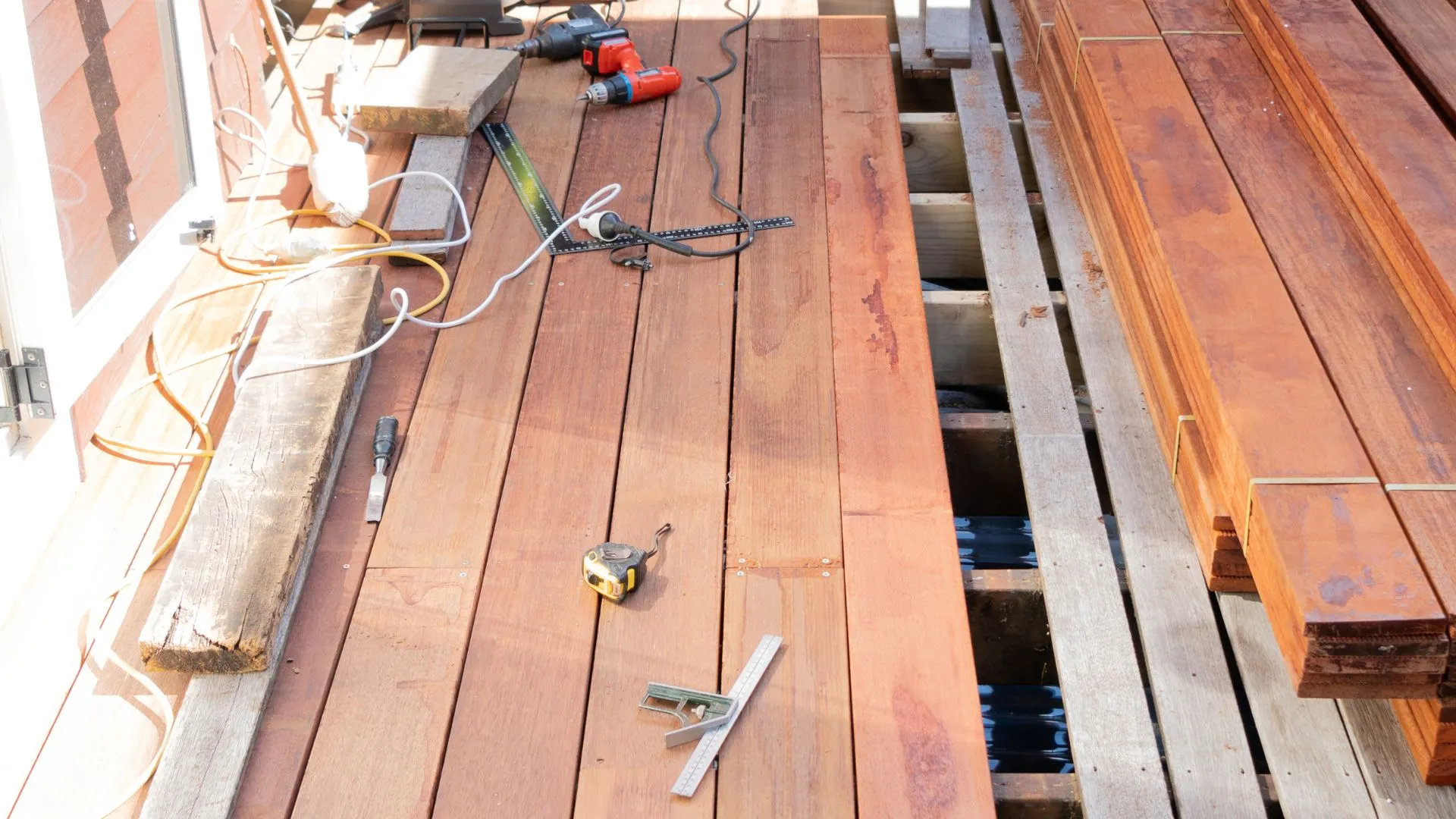 Deck rebuild in progress on a Stone Oak home with new joists over existing posts