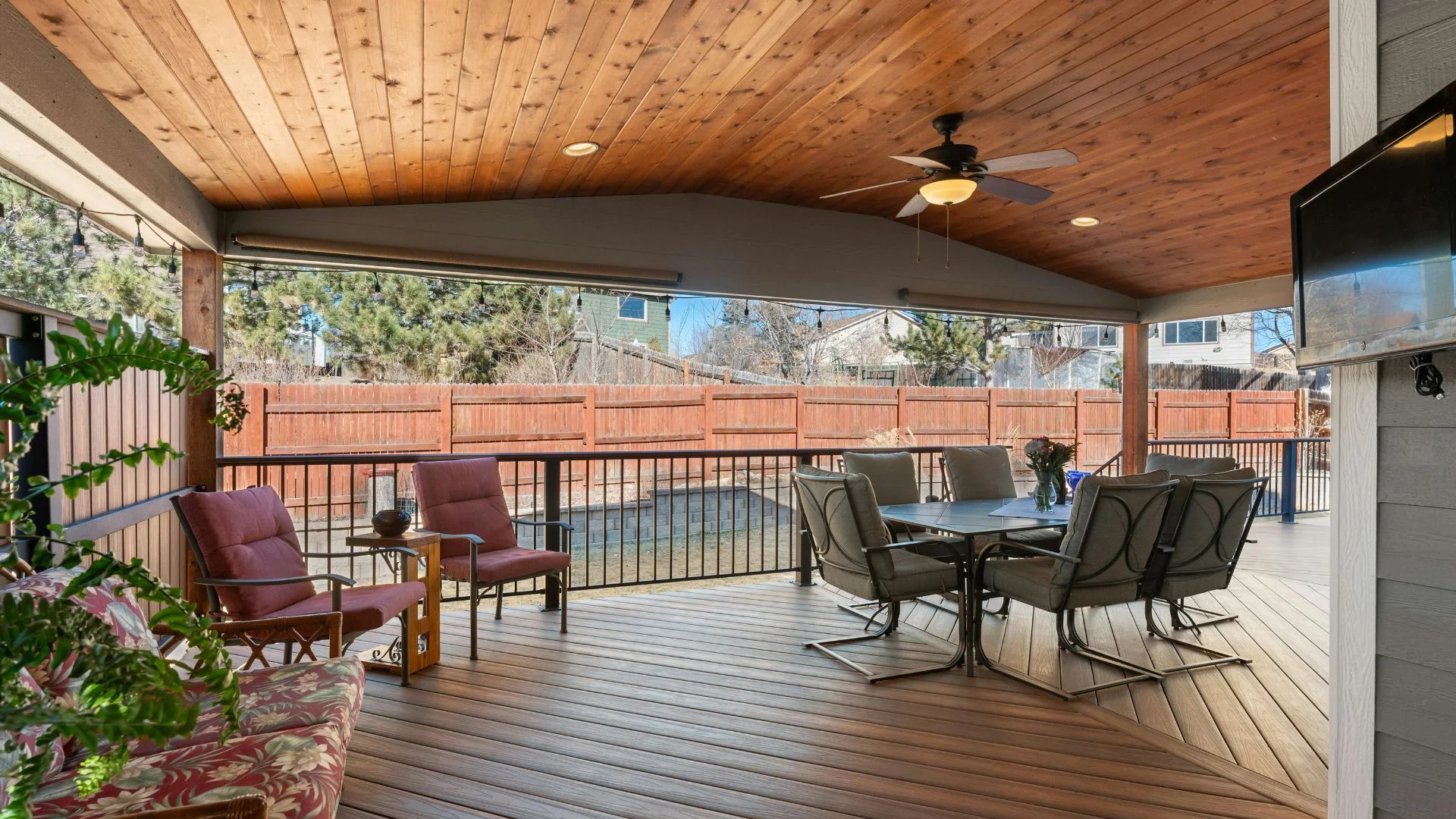 Solid roof patio cover installed over a backyard patio in San Antonio, TX